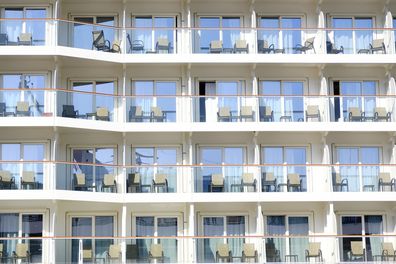 Ketchikan, Alaska -- August 8, 2024: Close up of cruise ship balcony with no people. Relaxing deck chairs are on each balcony.