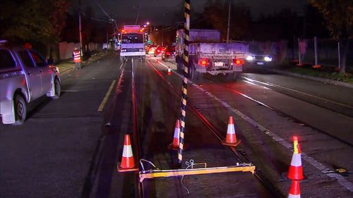 A power pole was toppled by the truck. (9NEWS)