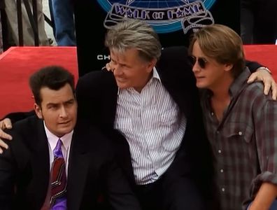 Charlie Sheen (left) with dad Martin Sheen (centre) and brother Emilio Estevez (right)