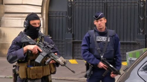 (Heavy police presence at French court)