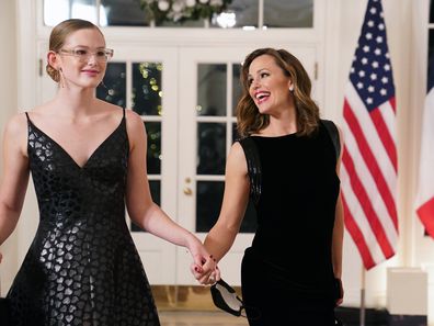 Actress Jennifer Garner and her daughter Violet arrive for the White House state dinner for French President Emmanuel Macron at the White House on December 1, 2022 in Washington, DC. The official state visit is the first for the Biden administration. 