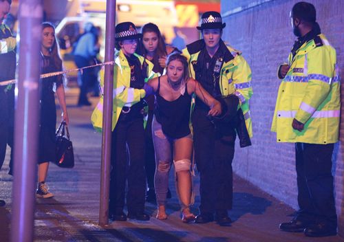 Scores of people were injured by a suspected suicide bomber and crowds rushing to escape Manchester Arena. At least 19 people have been killed by a probable suicide bomber who attacked the Ariana Grande concert in Manchester. Credit: Joel Goodman/LNP