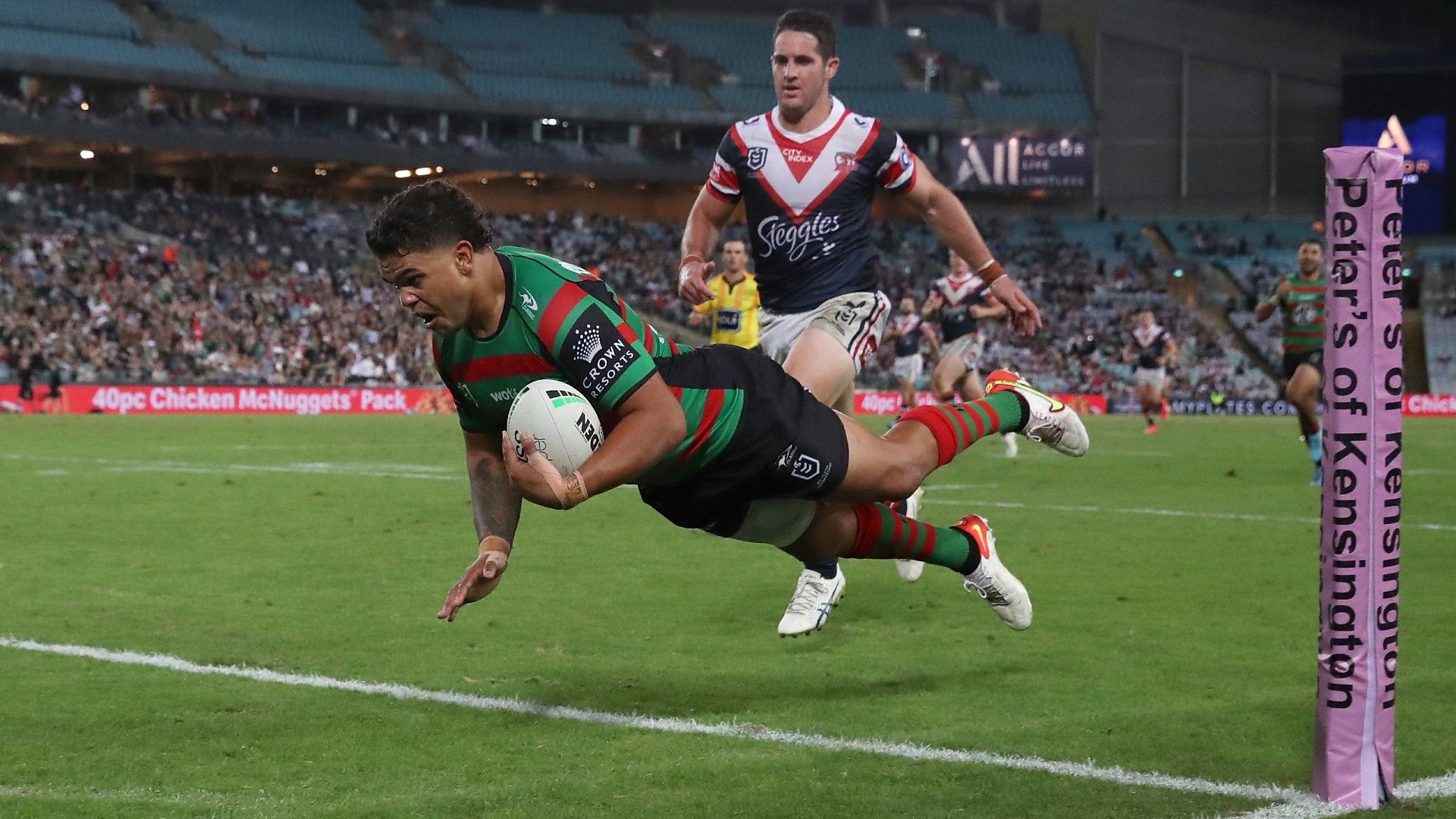 Latrell Mitchell streaks away to seal victory in bitter grudge match
