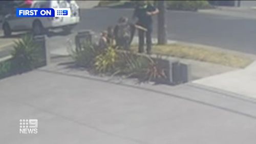 CCTV has captured the moment a toddler stumbled into the hands of rescuers after he was abandoned by a thief in Melbourne. 