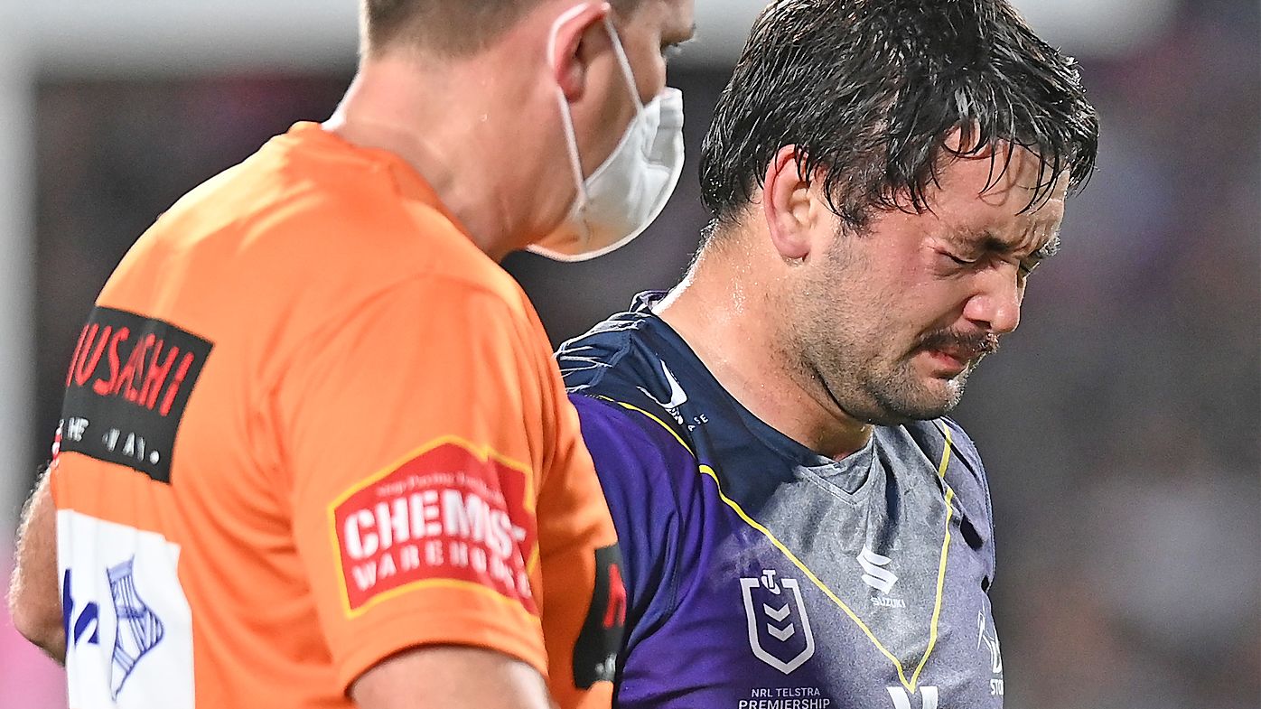  Brandon Smith of the Storm is assisted off the field after a head knock