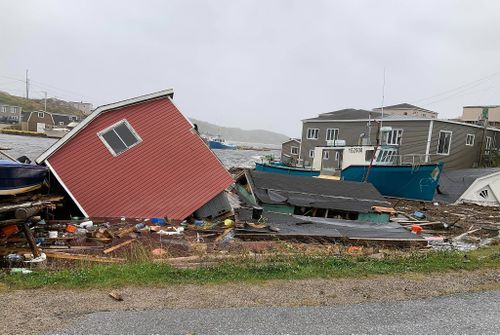 This photo courtesy of Pauline Billard shows the destruction caused by Hurricane Fiona at Rose Blanche, 45 kilometers (28 miles) east of Port aux Basques, Newfoundland and Labrador, on Saturday, September 24, 2022.  (Pauline Billard via AP)