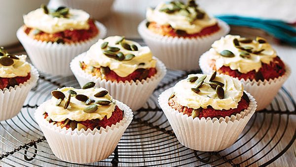 Carrot, coconut and pepita muffins with lime cream cheese icing