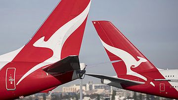 Qantas jet tails at Sydney Airport (Getty)