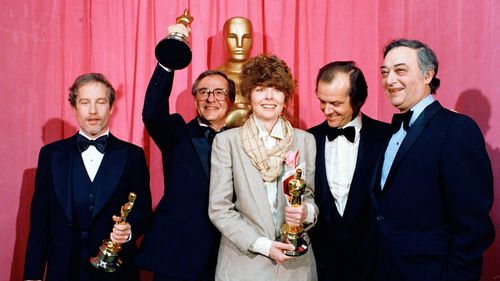FILE - Oscar winners pose with their statuettes at the Academy Awards presentation in Los Angeles, April 3, 1978, from left: Richard Dreyfuss, best actor for "The Goodbye Girl"; Charles H. Joffe, best picture for "Annie Hall"; Diane Keaton, best actress for "Annie Hall"; presenter Jack Nicholson, and producer Jack Rollins of United Artists. (AP Photo, File)