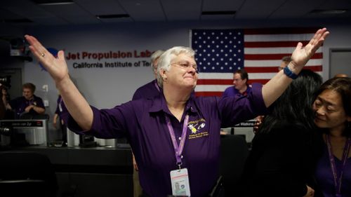 Flight director Julie Webster reacts in mission control at NASA's Jet Propulsion Laboratory after confirmation of Cassini's demise on September 15, 2017. (AP)