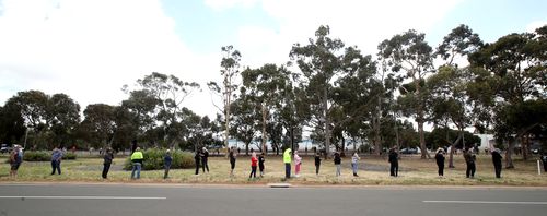  People queuing at the COVID-19 Testing site at Parafield Airport 