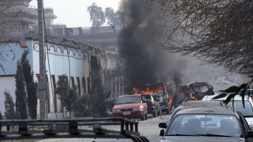 Vehicles burn after a deadly suicide attack in Jalalabad, Afghanistan, on Jan. 24, 2018. Photo: AP