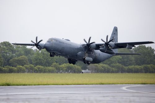 In this photo provided by the Australian Defense Force, a Royal Australian Air Force C-130J Hercules aircraft departs from Richmond, Australia Tuesday, Jan. 18, 2022, to assist the Tonga government after the eruption of an undersea volcano. (CPL Kylie Gibson/Australian Defense Force via AP)