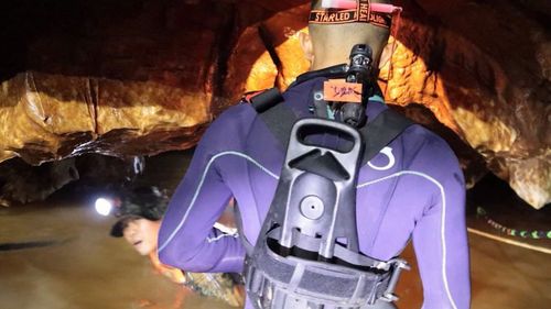Rescuers entering the cave system. (Thai Navy SEAL)