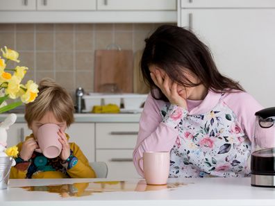 Exhausted mum with a toddler