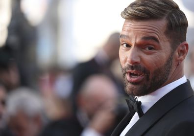 Ricky Martin poses for photographers upon arrival at the premiere of the film 'Elvis' at the 75th international film festival, Cannes, southern France, May 25, 2022. 