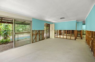 Uninhabitable home sold auction Currumbin Valley Queensland Olympic swimmer Allan Wood Domain 
