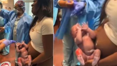 Woman gives birth to baby in hospital corridor. 