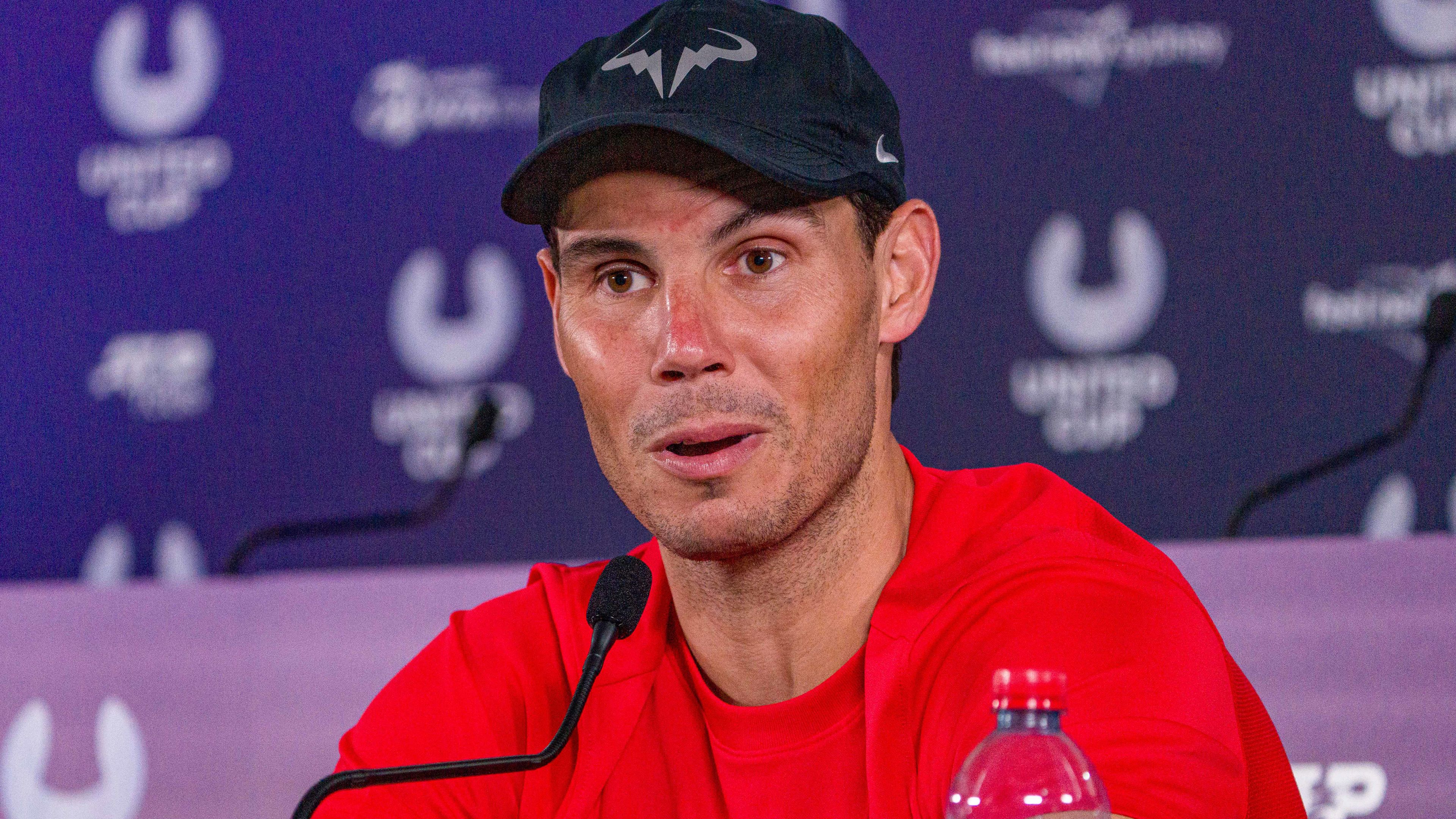 Rafael Nadal gives a media interview after losing his Group D singles match against Alex De Minaur.