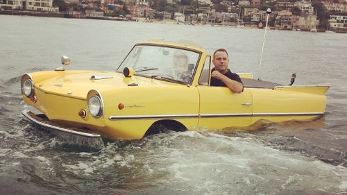 The Amphicar takes a splash in Sydney Harbour today. 