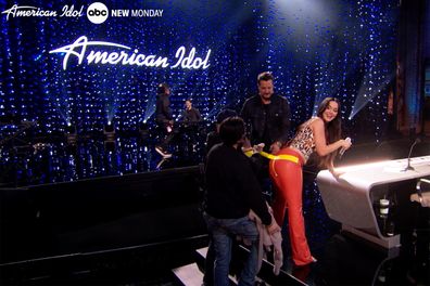 Katy Perry laughs off wardrobe malfunction after splitting pants on American Idol.