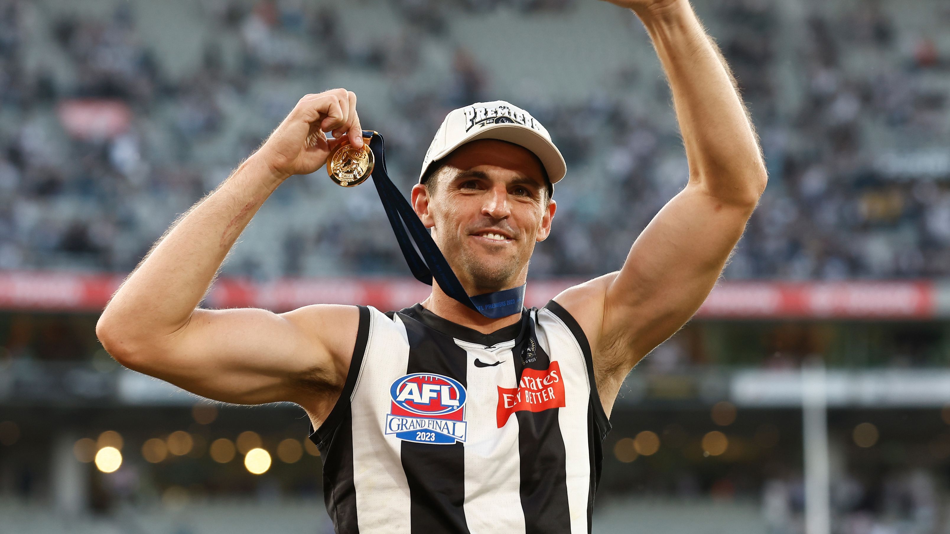 Scott Pendlebury celebrates his second premiership medal.