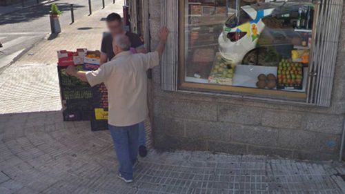 The Google Street View car can be seen in the reflection of the window behind Gioacchino Gammino.