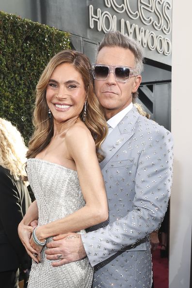 Robbie Williams and Ayda Field at the 82ND ANNUAL GOLDEN GLOBES®, airing live from the Beverly Hilton in Beverly Hills, California on Sunday, January 5, 2025 at 8 PM ET/5 PM PT, on CBS and streaming on Paramount+. Photo: Stewart Cook/CBS ©2025 CBS Broadcasting, Inc. All Rights Reserved.