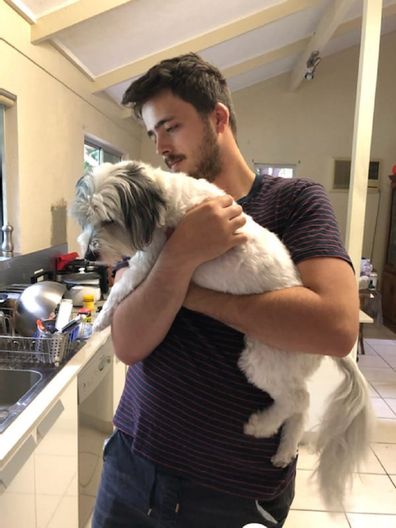 Mother and son epilepsy Lindsay with his dog