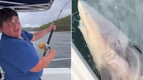 Teenager Addison Hodge reels in the bull shark.