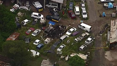 The fatal caravan fire happened at a smash repairs business in Darra. (9NEWS)