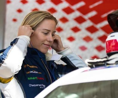 Emily Duggan race car driver preparing for a race