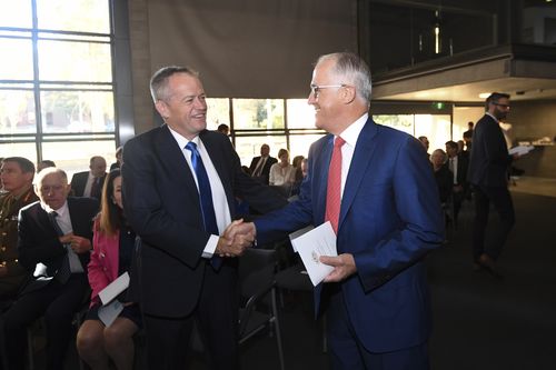 Bill Shorten (left) shakes hands with Malcolm Turnbull as they attend an Ecumenical Service for the commencement of the parliamentary year at the Australian Centre for Christianity and Culture in Canberra. (AAP)