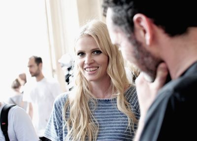 <p>Lara Stone opened the show in a lavender gown.&nbsp;</p>