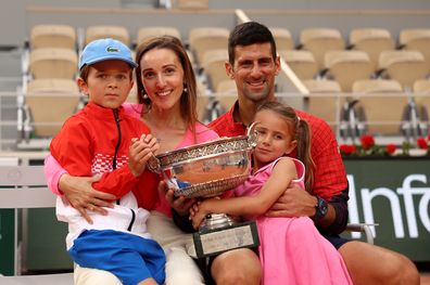 Novak Djokovic of Serbia, partner, Jelena Djokovic and their children pose after winning the Men's Singles Final of the 2023 French Open.