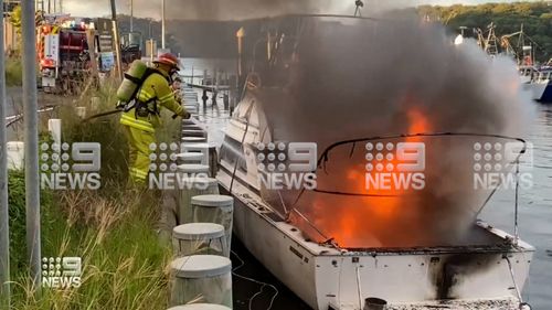 Firefighters work to extinguish the ferocious flames.