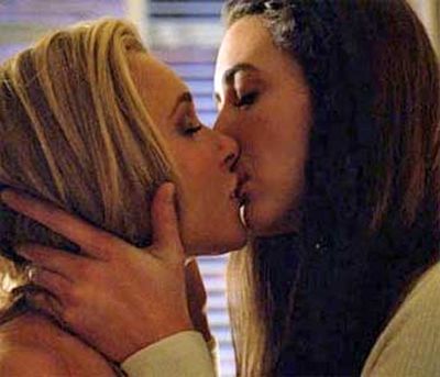 <B>The kiss:</B> Season four of the super-powered drama put immortal main character Claire Bennet (Hayden Panettiere) into a college dorm with new roommate Gretchen Berg (Madeleine Zima). "Experimentation" ensued.<br/><br/><B>Tacky or touching?</B> Insultingly tacky. A dying show whose audience is mostly comprised of boys assumed it would revive ratings by getting a cheerleader and another college girl to, you know, totally make out and stuff.