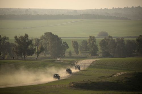 Israeli military vehicles move towards  the Gaza Strip on January 1, 2024 in Israel. 
