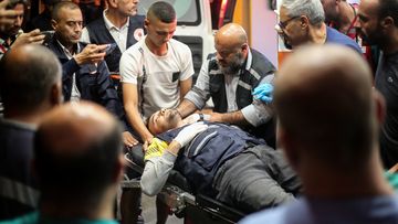 Palestinians injured during Israeli raids arrive at Nasser Hospital