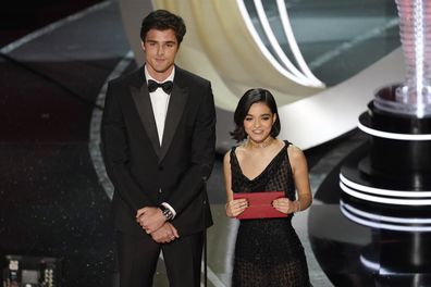 Jacob Elordi, left, and Rachel Zegler present the award for best visual effects at the Oscars on Sunday, March 27, 2022, at the Dolby Theatre in Los Angeles. (AP Photo/Chris Pizzello)
