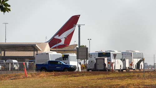 Passengers on a Qantas flight from India are transported to the Howard Springs quarantine facility in Darwin, Australia.