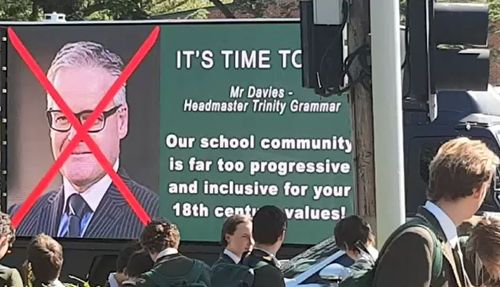 'It's time to go': A truck with the headmasters picture rolls through the school grounds. (9NEWS)