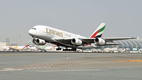 Emirates passenger jet takes off.