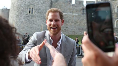 Prince Harry met with well-wishers at Windsor before his big day. (Getty)