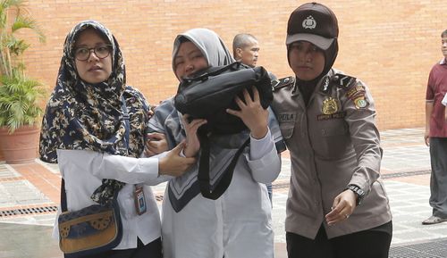 Stricken relatives are arriving at Indonesia's National Search and Rescue Agency headquarters in Jakarta for word of their loved ones on the Lion Air plane.