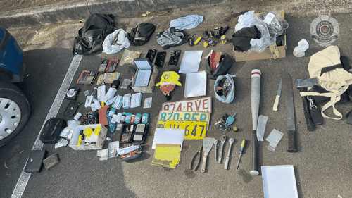 Two ﻿people person been arrested astatine a situation car parkland aft officers allegedly recovered homemade guns, a machete and different forbidden items during a hunt of their vehicle.