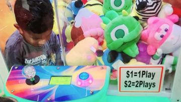 Queensland boy Imran Hussein got stuck in a claw machine at the Lollypops playcentre in Strathpine.