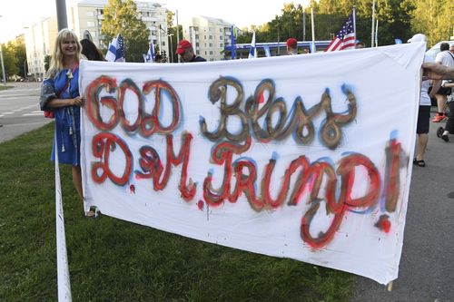 A Trump fan shows off their love for the president and First Lady. Picture: AAP