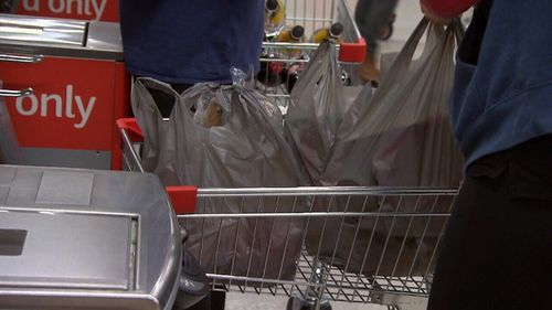 The plastic bag ban could mean forgetful shoppers have to fork out extra to carry their shopping.