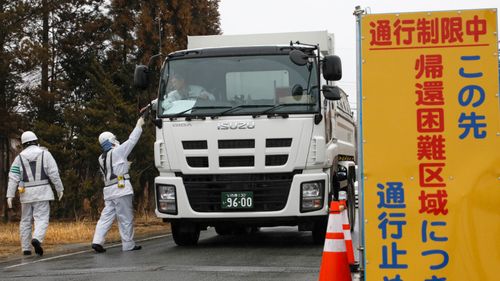 Radioactive checks are carried out around the affected power plant. (AP).